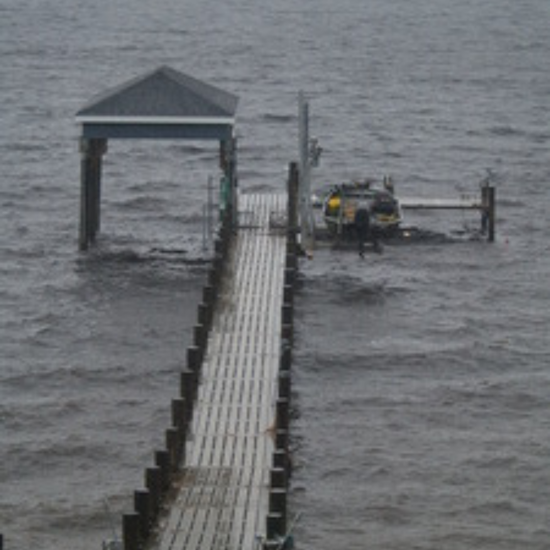 Dock and boat slip standing in-tact after Hurricane Irene, Bobby Cahoon Marine Construction