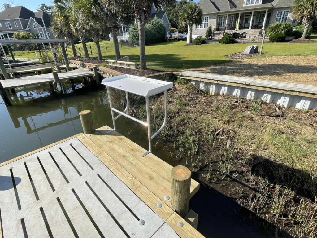 boat slip and dock with a built-in cleaning station. Bobby Cahoon Marine Construction