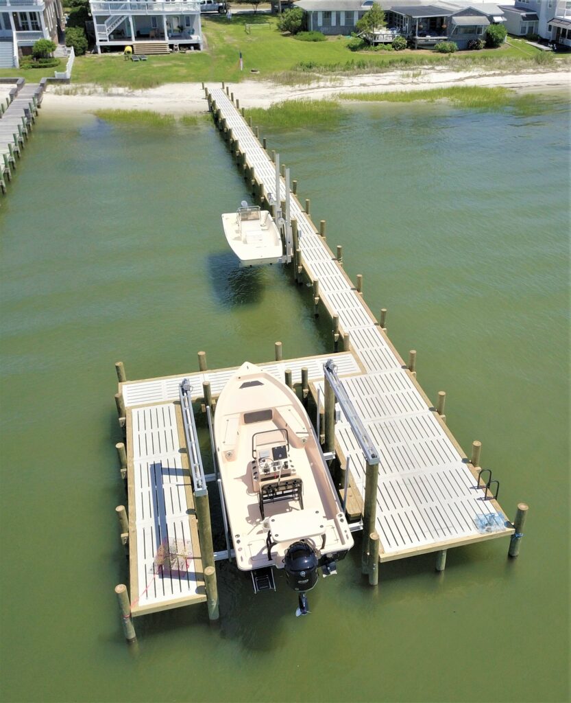 overhead shot of concrete pier with boat lifts, Bobby Cahoon Marine Construction