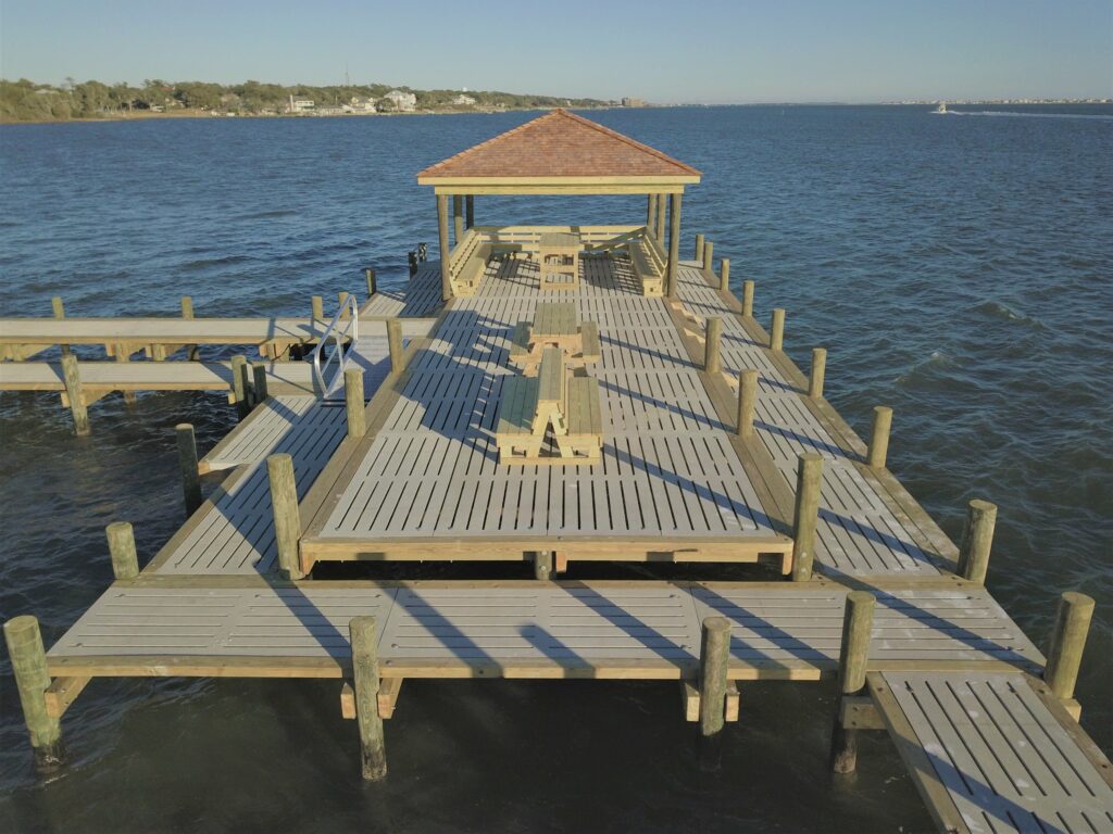 large concrete dock with seating and gazebo Bobby Cahoon Marine Construction