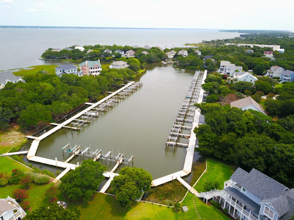 drone view of large dock with multiple boat slips, Bobby Cahoon Marine Construction