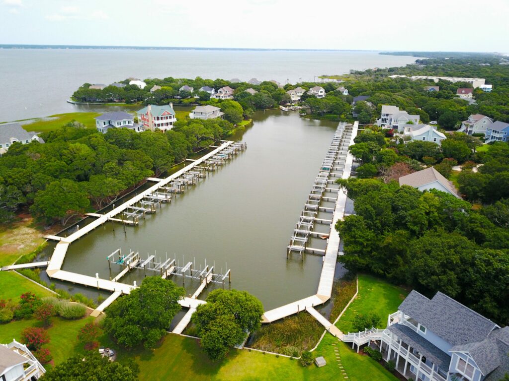 dock with multiple boat lifts on a coastal waterway, Bobby Cahoon Marine Construction