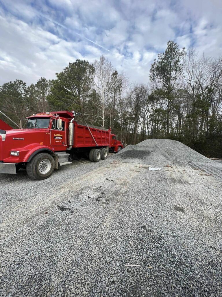 Truck hauling gravel, Bobby Cahoon Marine Construction